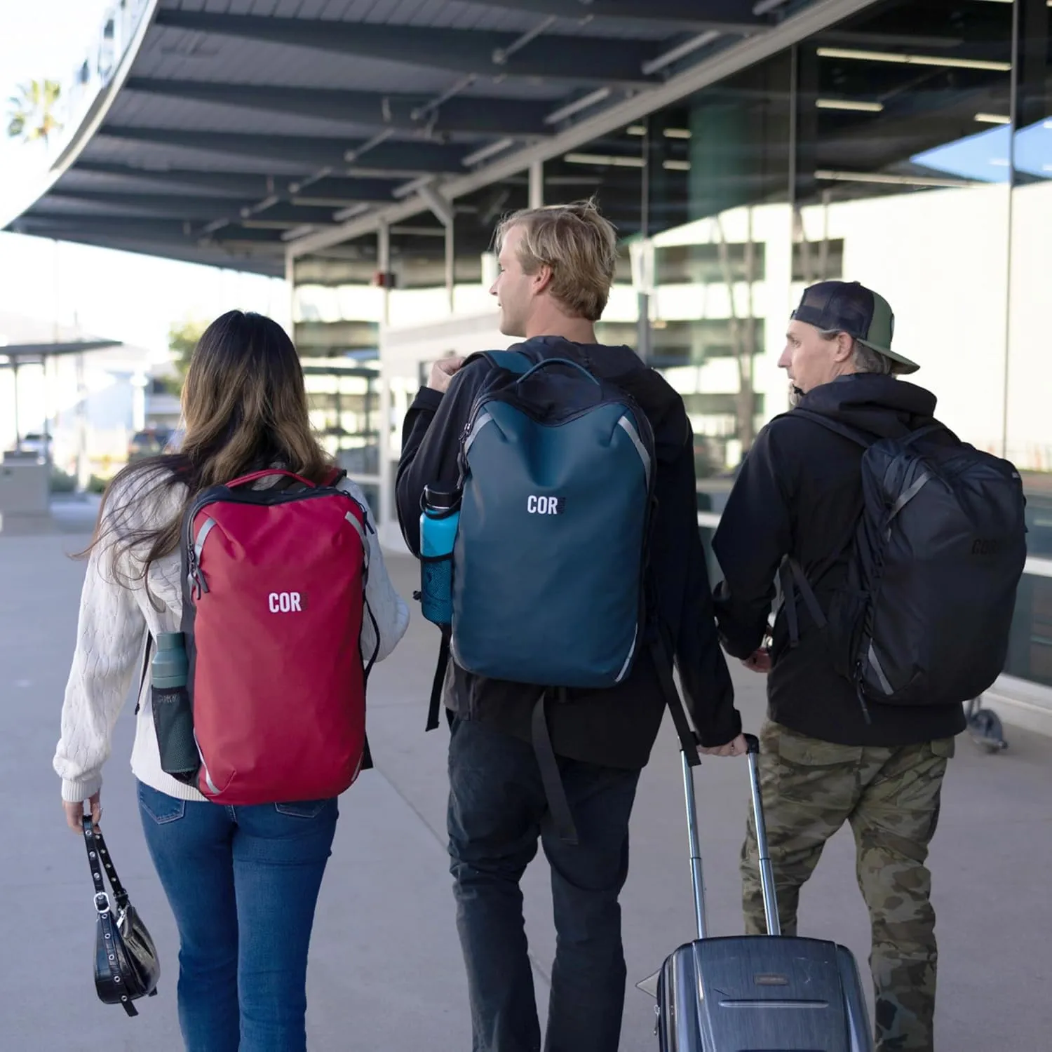 COR Surf Travel Backpack | Flight Approved Carry On Laptop Backpack with Secret Passport Pockets | The Island Hopper (28L, Lava Red)
